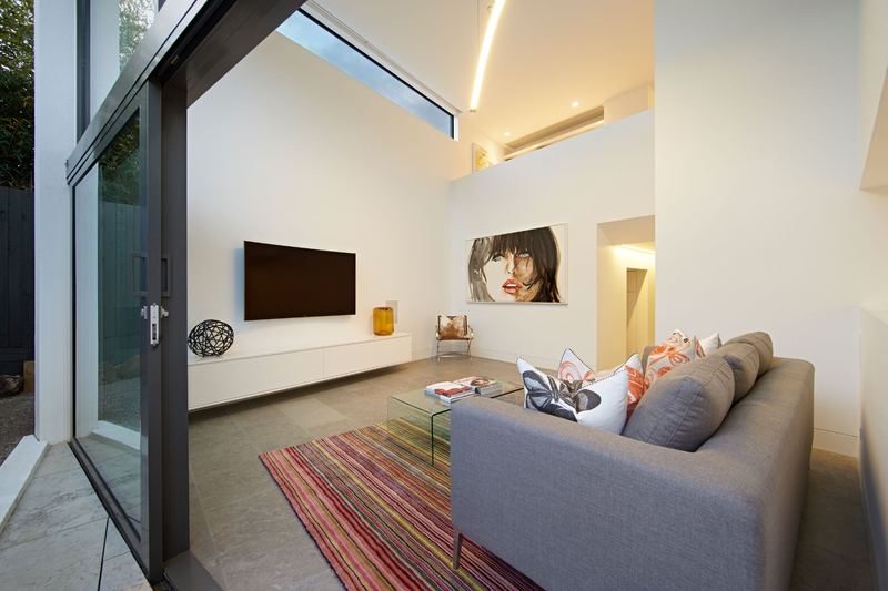 The Sculptural Living Home — coastal pavilion with board-formed concrete